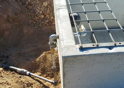 water trough installation by Spur X Ranch Improvements